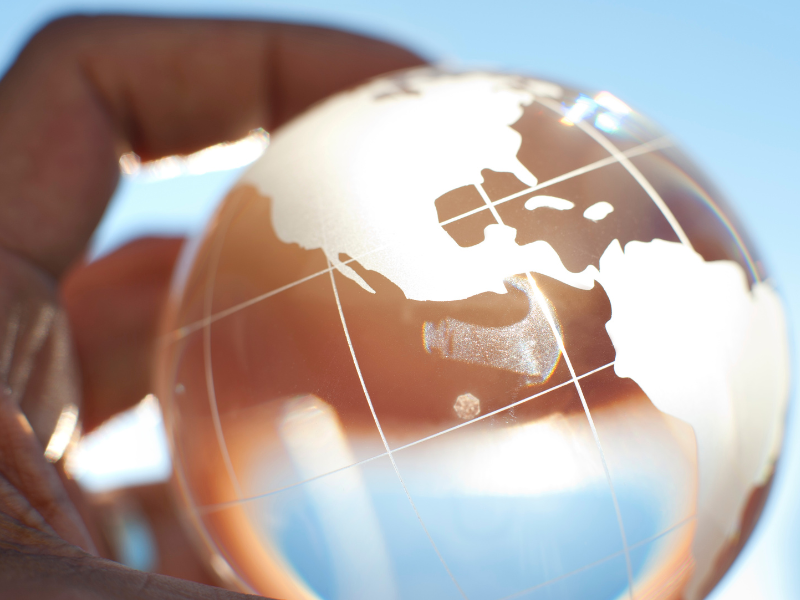 hand holding globe