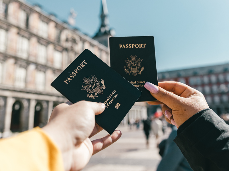 hands holding passport