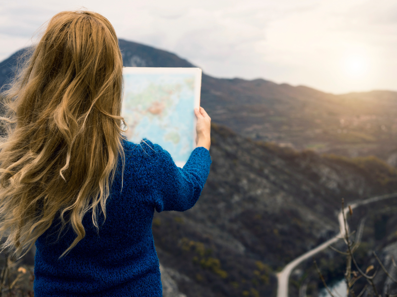 Girl looking at map